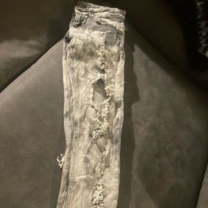 Acid washed ripped jeans
